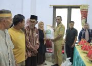 Pj Bupati Takalar Serahkan Bantuan di Kecamatan Mangarabombang