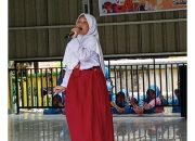 Andi Abira Sabet Juara Nyanyi Solo FLS2N”