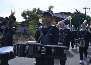 Aksi Memukau Drumband SMP 2 Marioriwawo Curi Perhatian